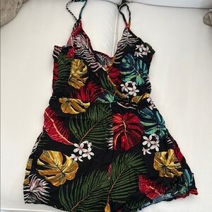 Tropical patterned romper. Adjustable straps.